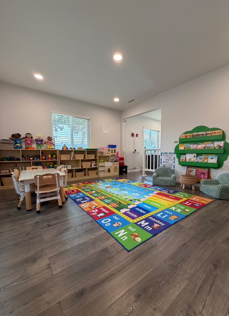 Bright Little Adventurers classroom with learning areas and books